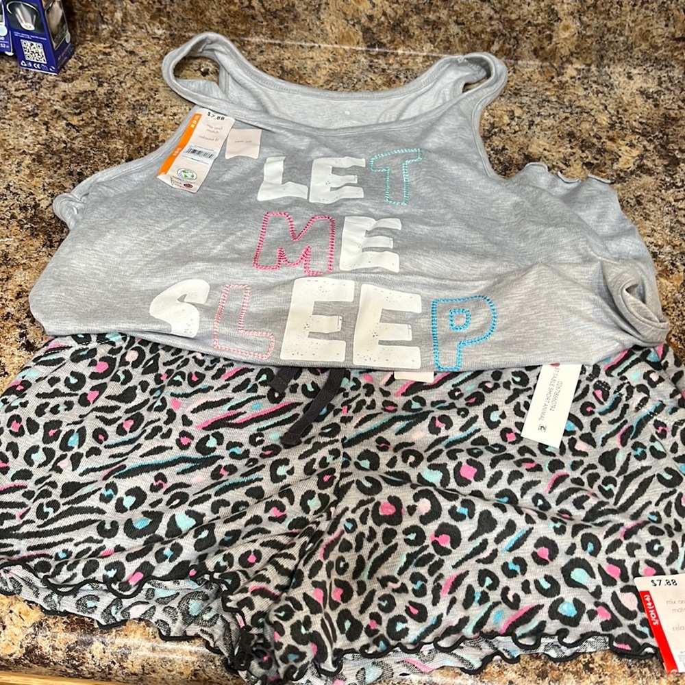 Ladies PJ Let me Sleep tank top and leopard print PJ bottoms.